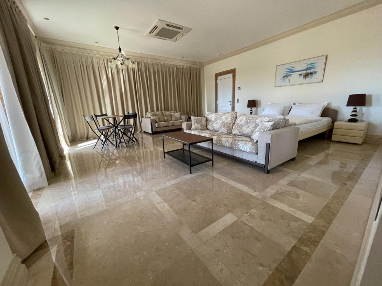 Nostrana Village Apartments Коскіну Номер фото